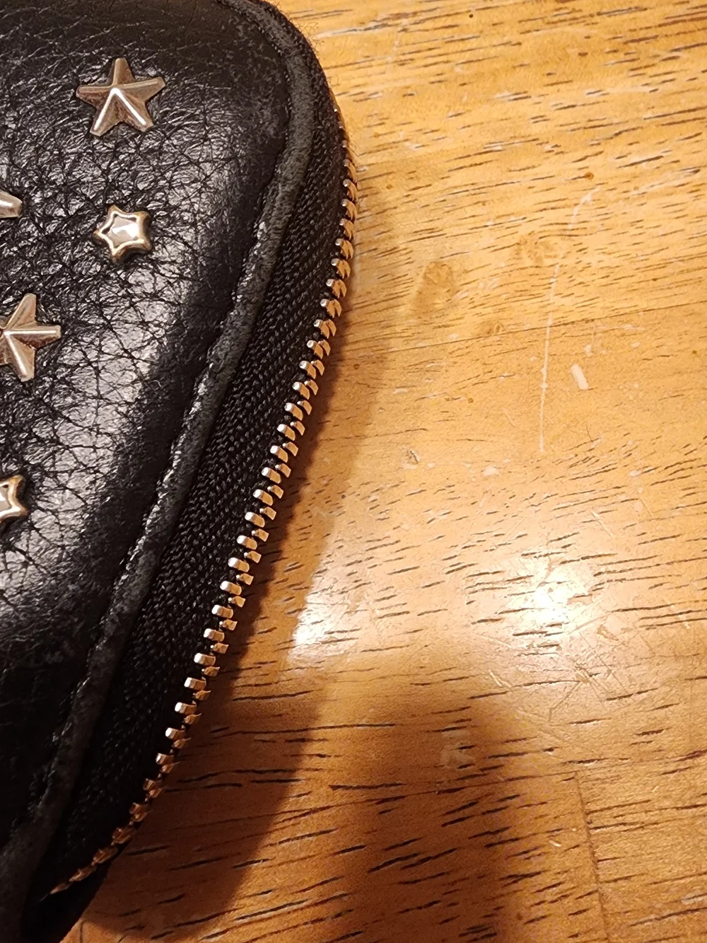 Jimmy Choo Filipa Star Studded Wallet, a black leather zip-around wallet